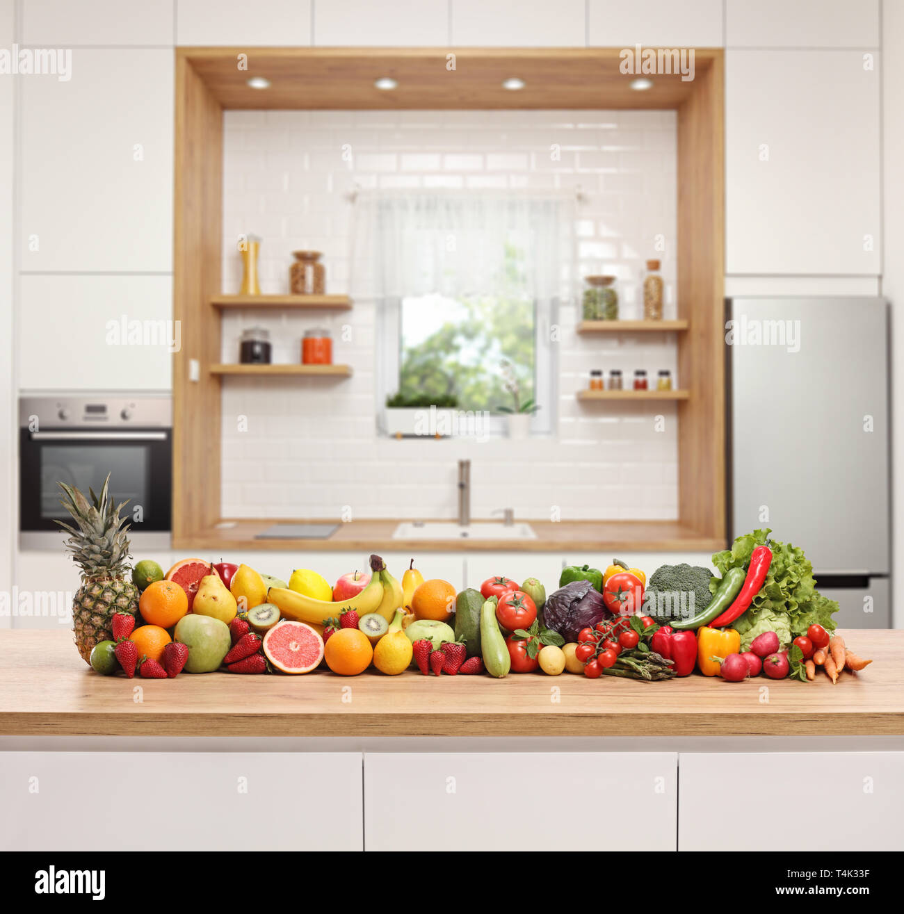Fruits And Vegetables Placed On A Wooden Counter In A Modern