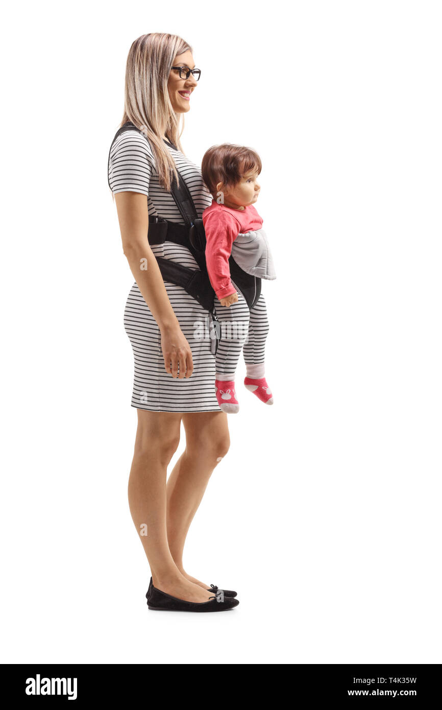 Full length shot of a mother and a baby in a carrier isolated on white background Stock Photo