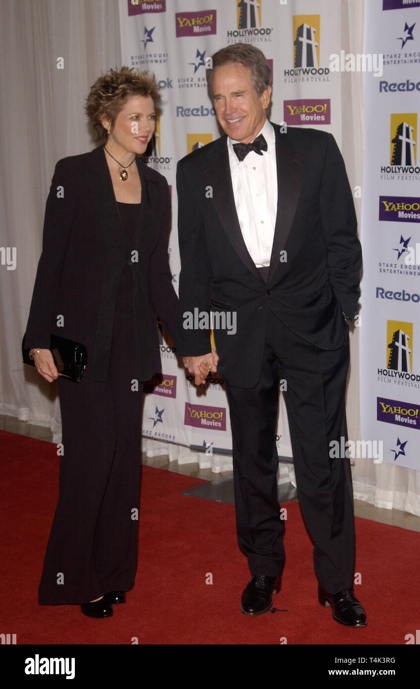 LOS ANGELES, CA. October 18, 2004: Actor WARREN BEATTY & wife actress ANNETTE BENING at the 8th Annual Hollywood Film Festival's Hollywood Awards at the Beverly Hills Hilton. She won the award for Actress of the Year. Stock Photo