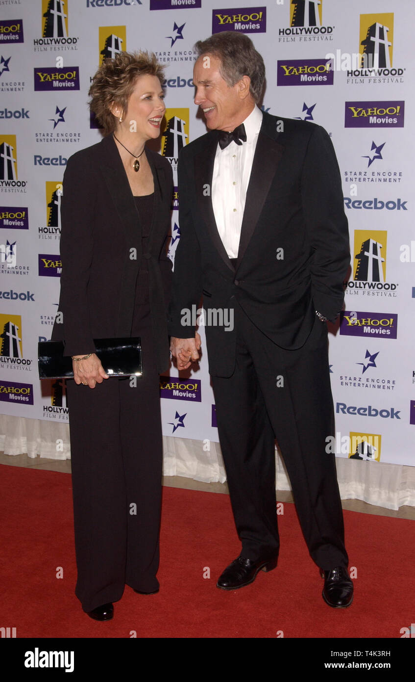 LOS ANGELES, CA. October 18, 2004: Actor WARREN BEATTY & wife actress ANNETTE BENING at the 8th Annual Hollywood Film Festival's Hollywood Awards at the Beverly Hills Hilton. She won the award for Actress of the Year. Stock Photo