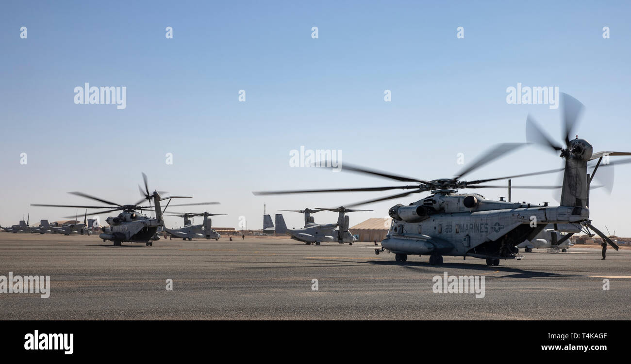 CAMP BEUHRING, Kuwait (April 14, 2019) U.S. Marine CH-53E Super Stallions with the 22nd Marine Expeditionary Unit taxi down the flight line prior to takeoff during a MEU exercise. Aircraft with Marine Medium Tiltrotor Squadron (VMM) 264 (Reinforced) carry out routine flights in order to maintain operational readiness. Marines and Sailors with the 22nd MEU and Kearsarge Amphibious Ready Group are currently deployed to the U.S. 5th Fleet area of operations in support of naval operations to ensure maritime stability and security in the Central region, connecting the Mediterranean and the Pacific  Stock Photo