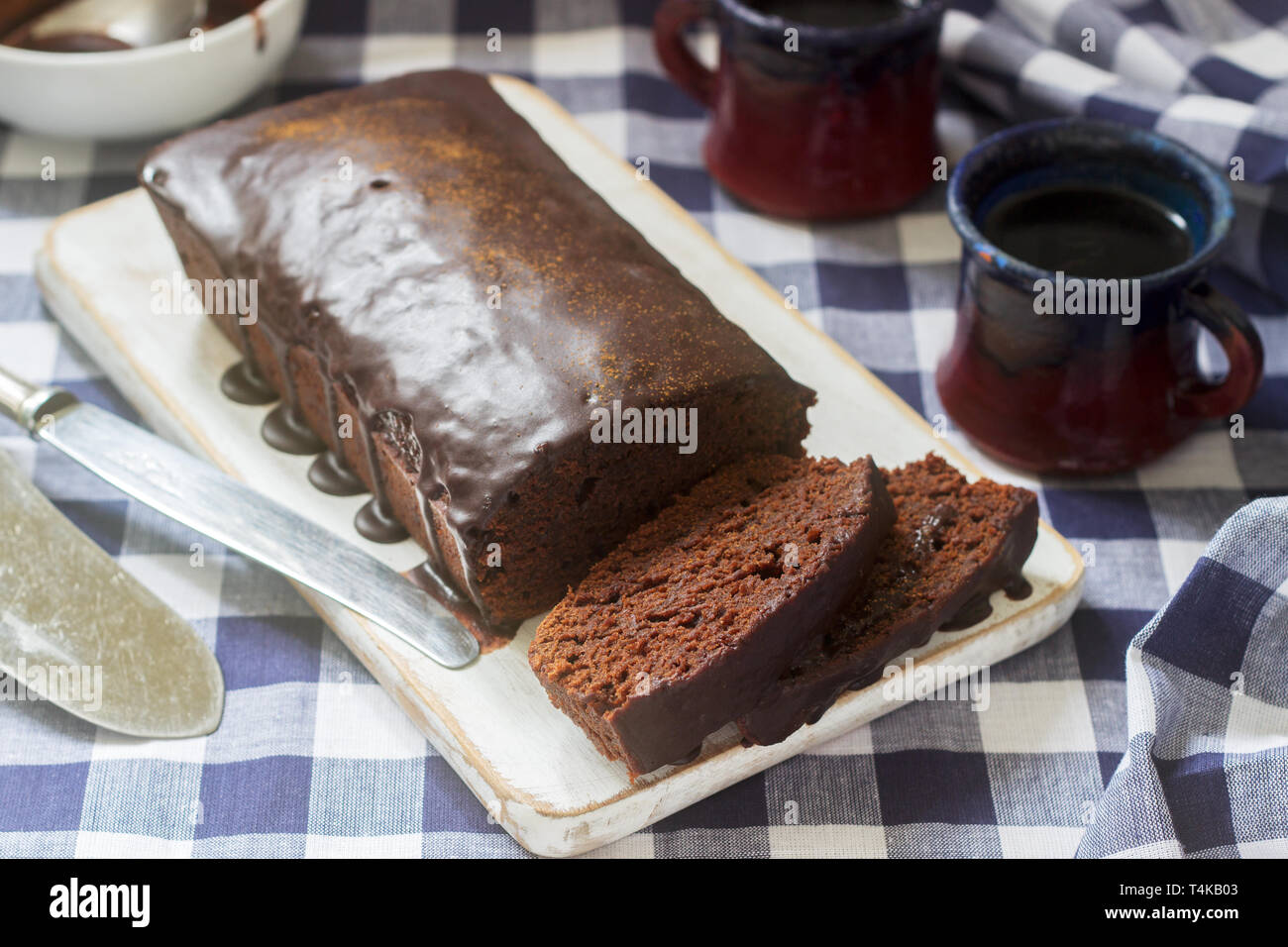 Vegan Mexican Chocolate Cake With Chili Cinnamon And Chocolate Icing Served With Coffee Selective Focus Stock Photo Alamy