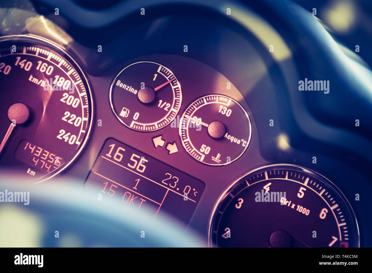 Closeup of the dashboard of a sports car, tachometer and fuel indicator Stock Photo Alamy