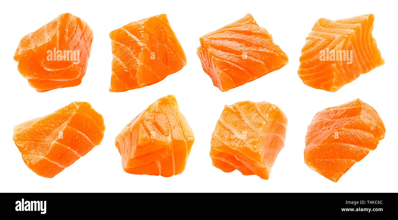 Salmon slices isolated on white background with clipping path, cubes of red fish, ingredient for sushi or salad Stock Photo