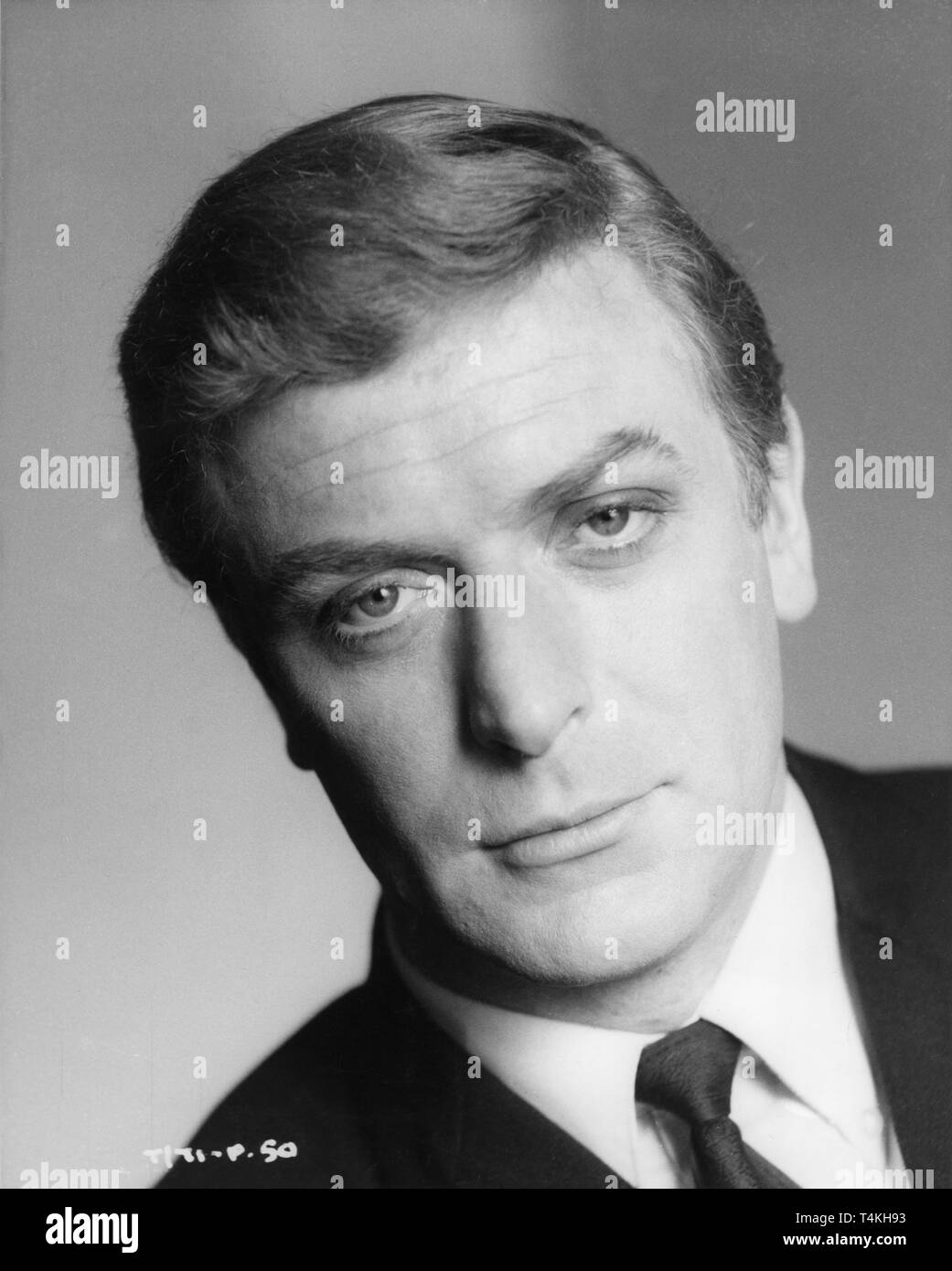 MICHAEL CAINE as Harry Palmer classic early portrait publicity for THE IPCRESS FILE director Sidney J. Furie novel Len Deighton Steven S.A. / Lowndes Productions Ltd / The Rank Organisation Stock Photo