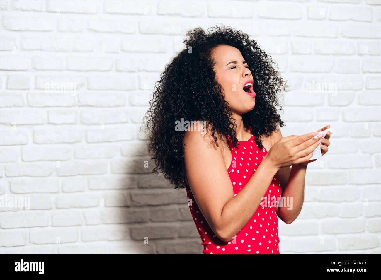 Sick Black Woman African American Girl Sneezing For Cold Allergy Stock Photo