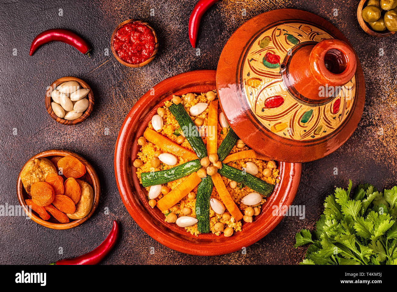 Vegetable tagine with almond and chickpea couscous, top view Stock