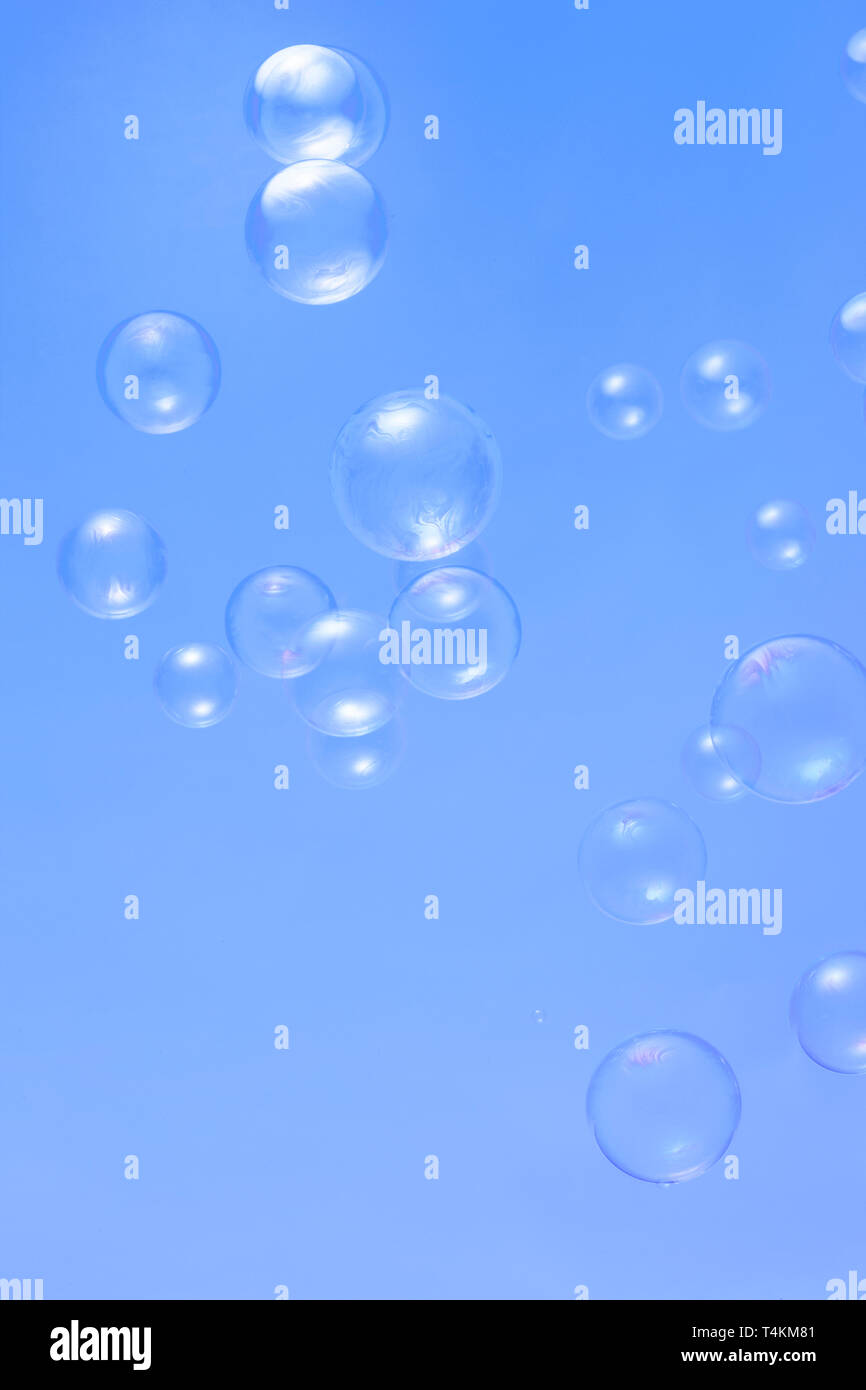 soup bubbles isolated on blue background Stock Photo