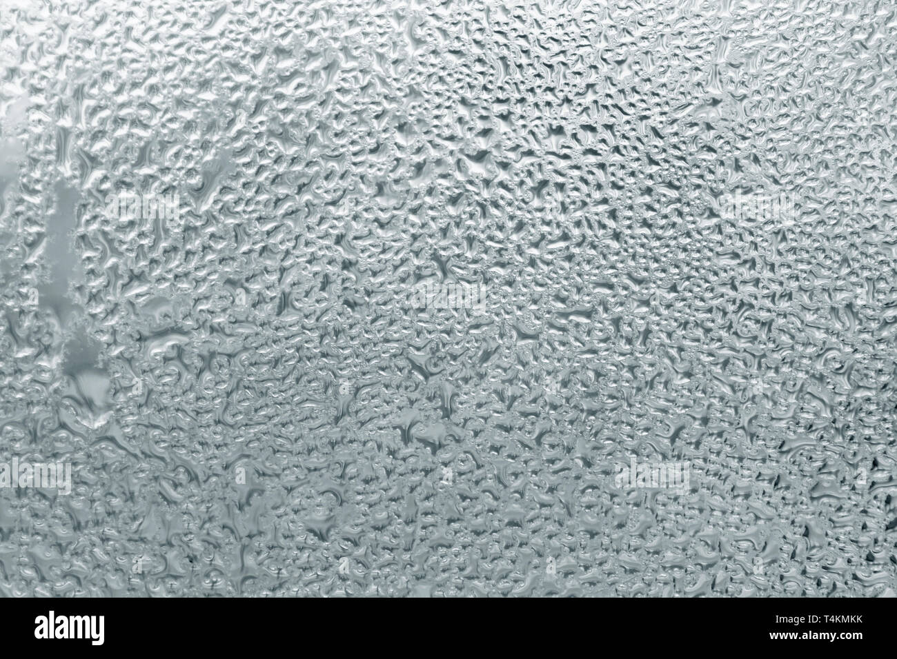 Misted muddy wet window glass as background Stock Photo - Alamy