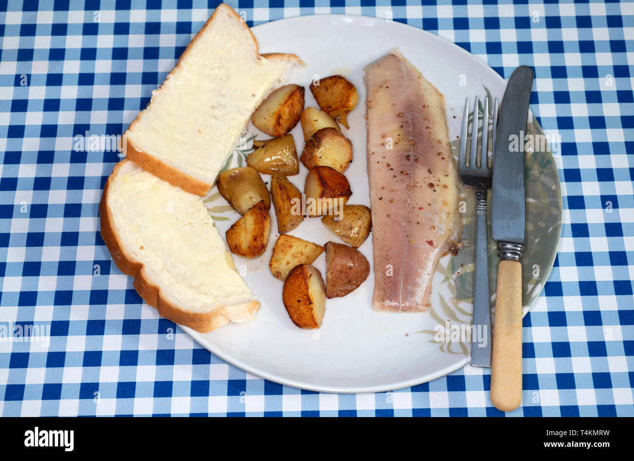 Rainbow trout with fried new potatoes Stock Photo