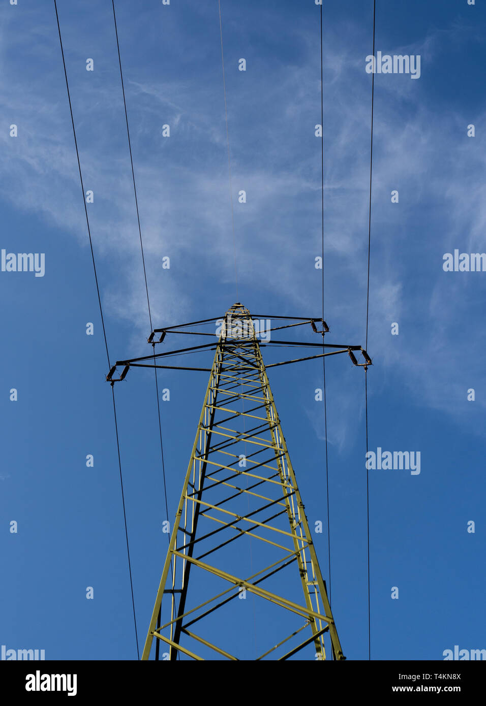 Electricity pylon and blue sky Stock Photo - Alamy