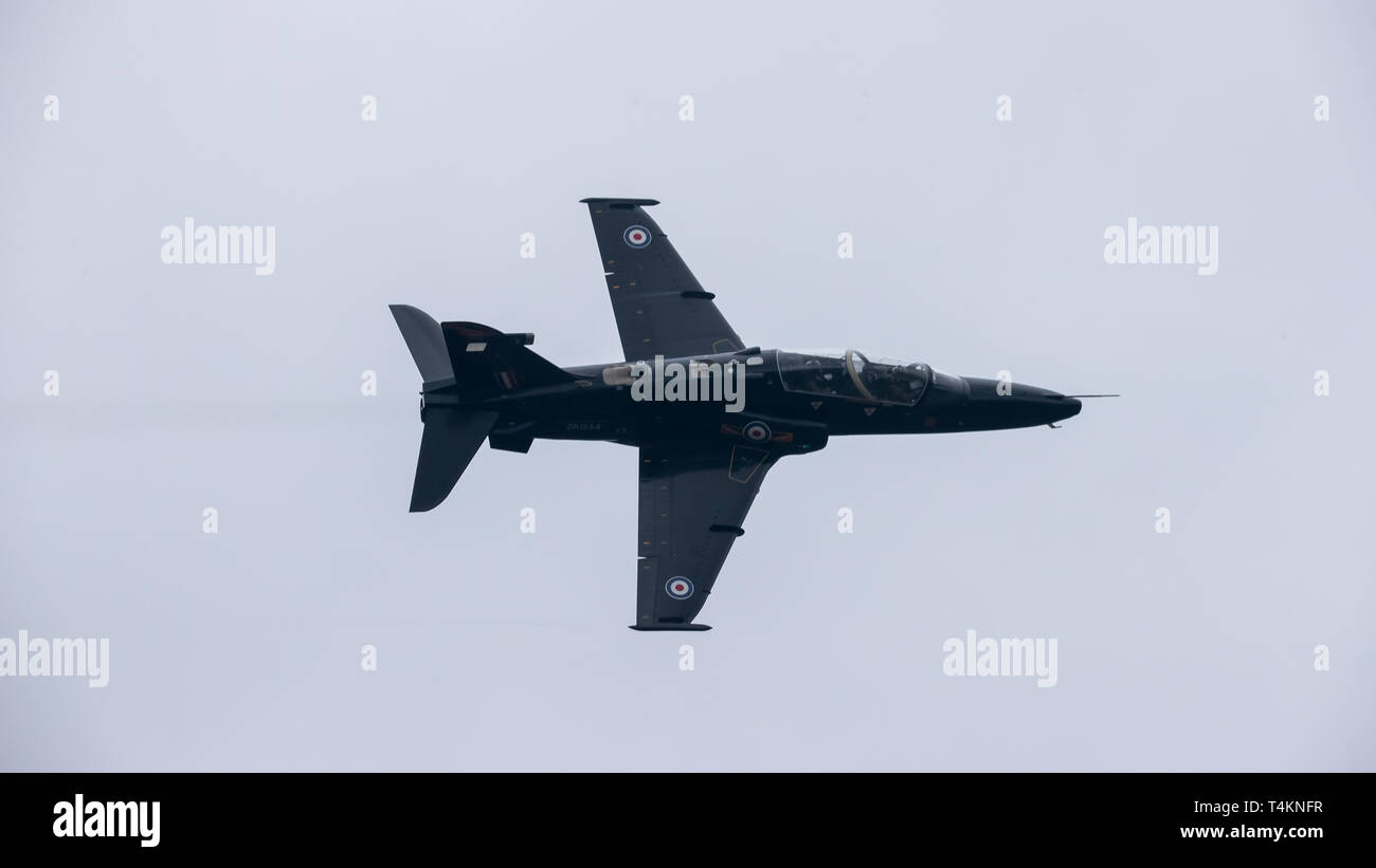 An RAF Hawk makes a training light through Mach Loop, Wales, UK. Stock Photo