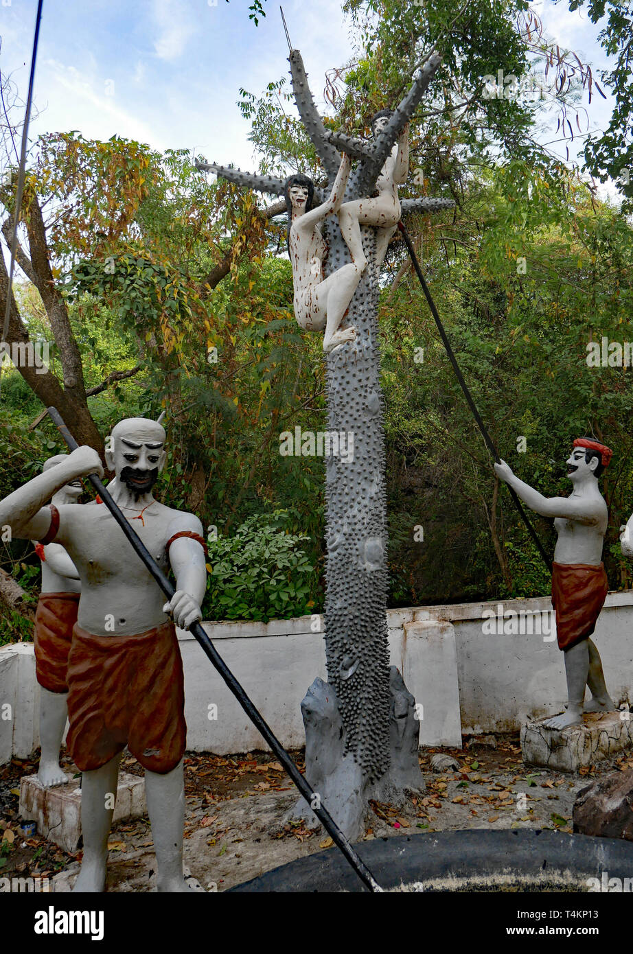 Torture in Buddhist Hell, Naraka. Sculptures near the Killing Caves, Phnom Sampeau, Battambang Cambodia. 07-12-2018 Stock Photo