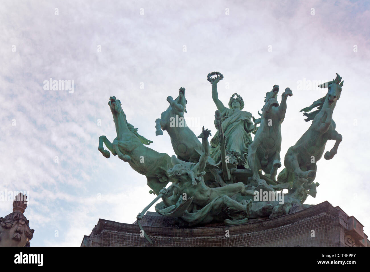 Paris, France - September 22, 2017: Sculpture of victorious four horses, winged genius, characteristic motif of Quadriga Imperial power. Immortality o Stock Photo