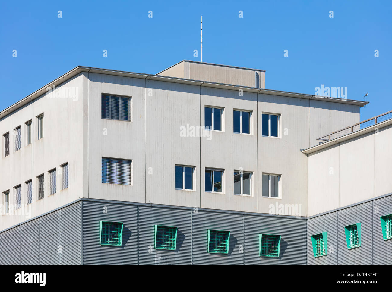 Kloten, Switzerland - September 30, 2016: upper part of the building of the Zurich Airport Prison. The Zurich Airport Prison (German: Flughafengefangn Stock Photo