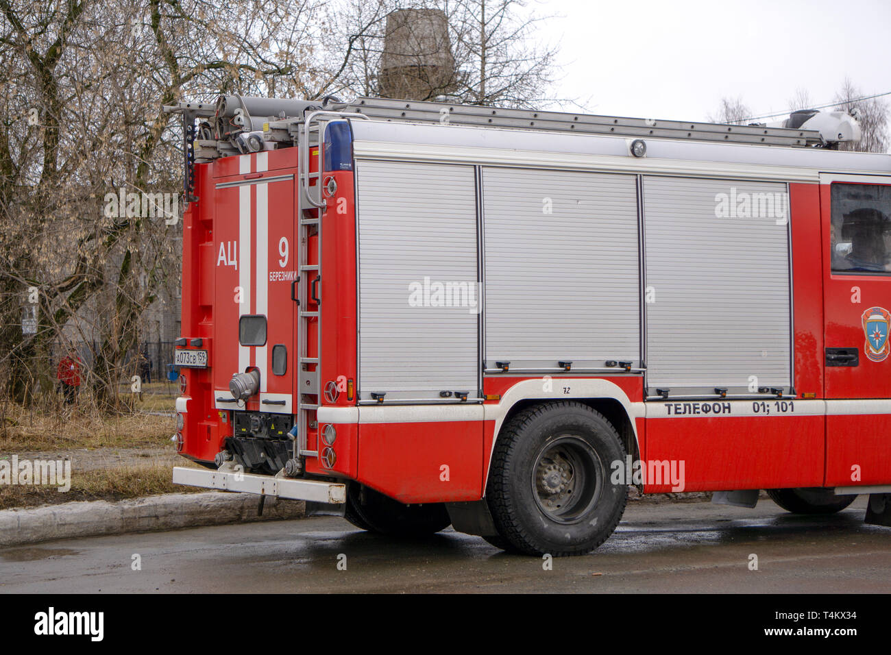 Fire Engine responding to an emergency driving with sirens and blue