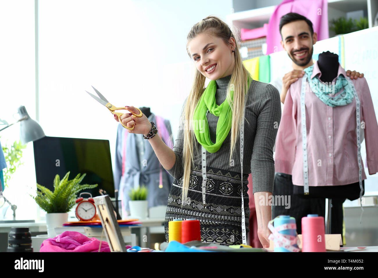 Two fashion designers at workplace creating Stock Photo - Alamy