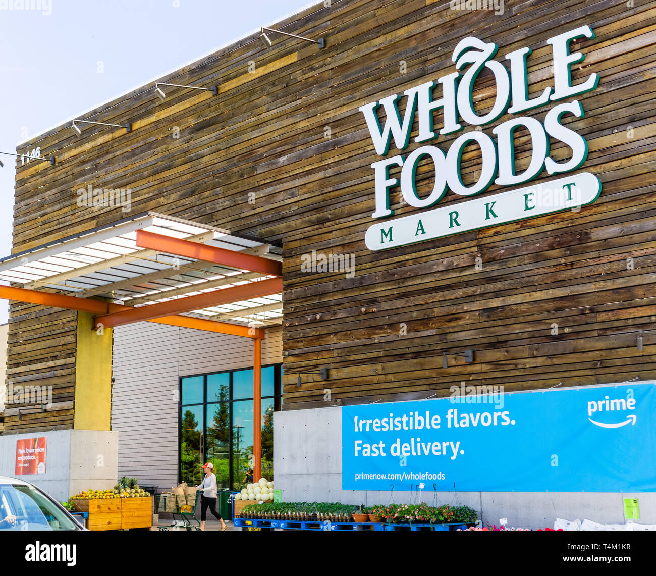 April 14, 2019 San Jose / CA / USA - Whole Foods store displaying an ad for Amazon Prime Membership Stock Photo