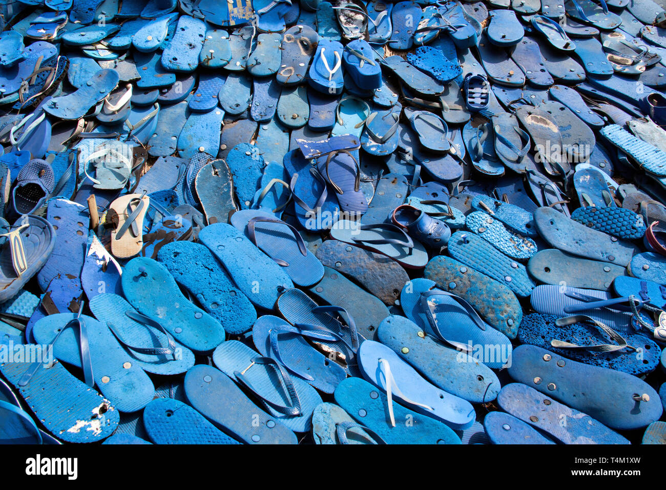 Recycled flip-flops at entrance to Desa Potato Head at Seminyak on Bali's west coast Stock Photo