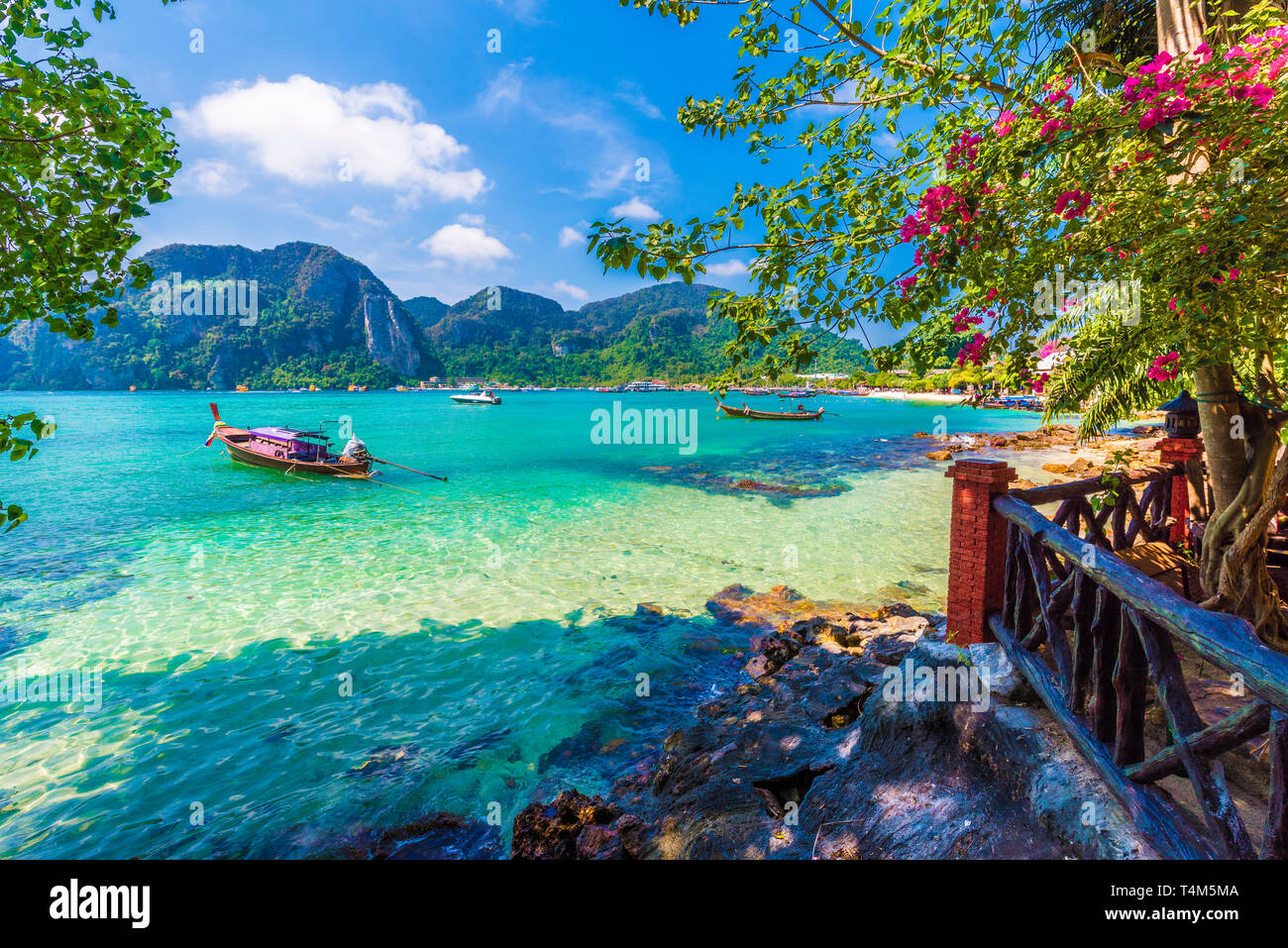 Beautiful summer scene and destination with mountains and turquoise sea water in Ton Sai Bay village, region of Phi Phi, Thailand Stock Photo