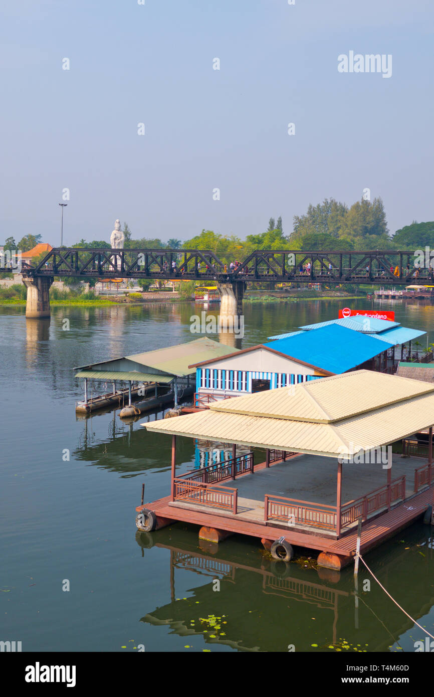 Houses, with Death Railway Bridge in the background, Mae Nam Khwae Yai, Kwai river, Kanchanaburi, Thailand Stock Photo