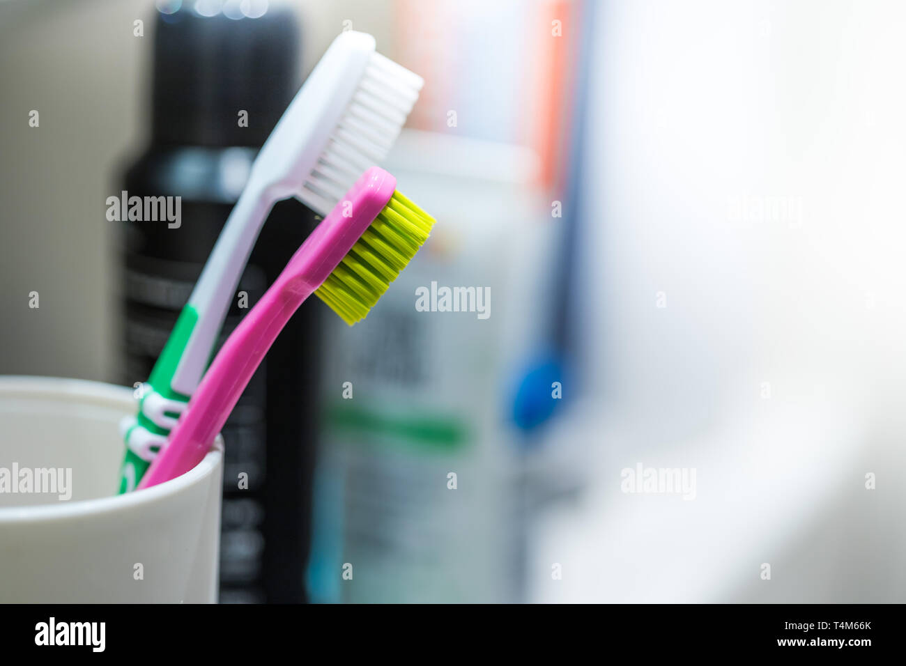 Colorful toothbrush in the bathroom, morning routine Stock Photo - Alamy