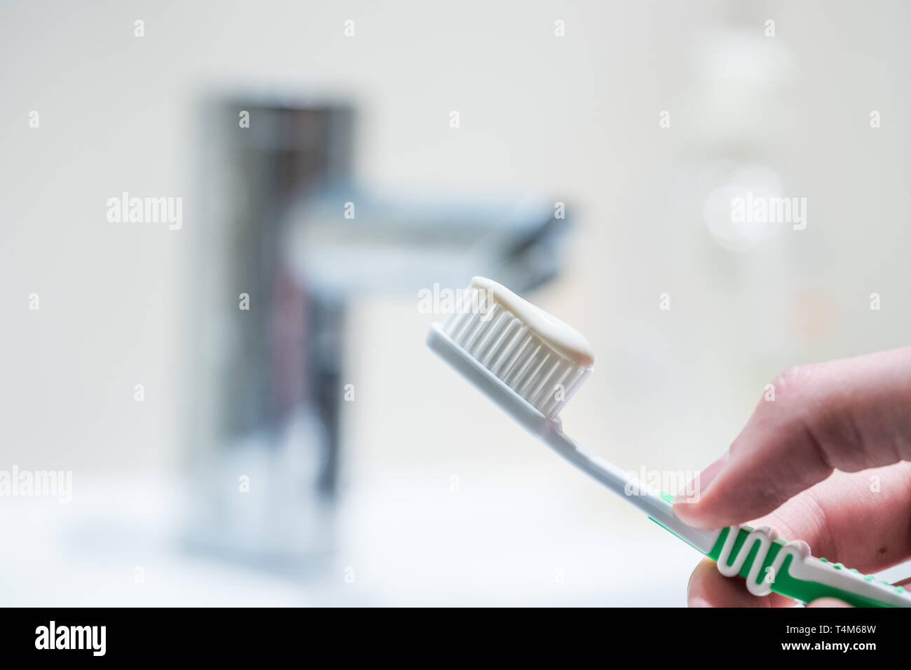 Colorful toothbrush in the bathroom, morning routine Stock Photo - Alamy