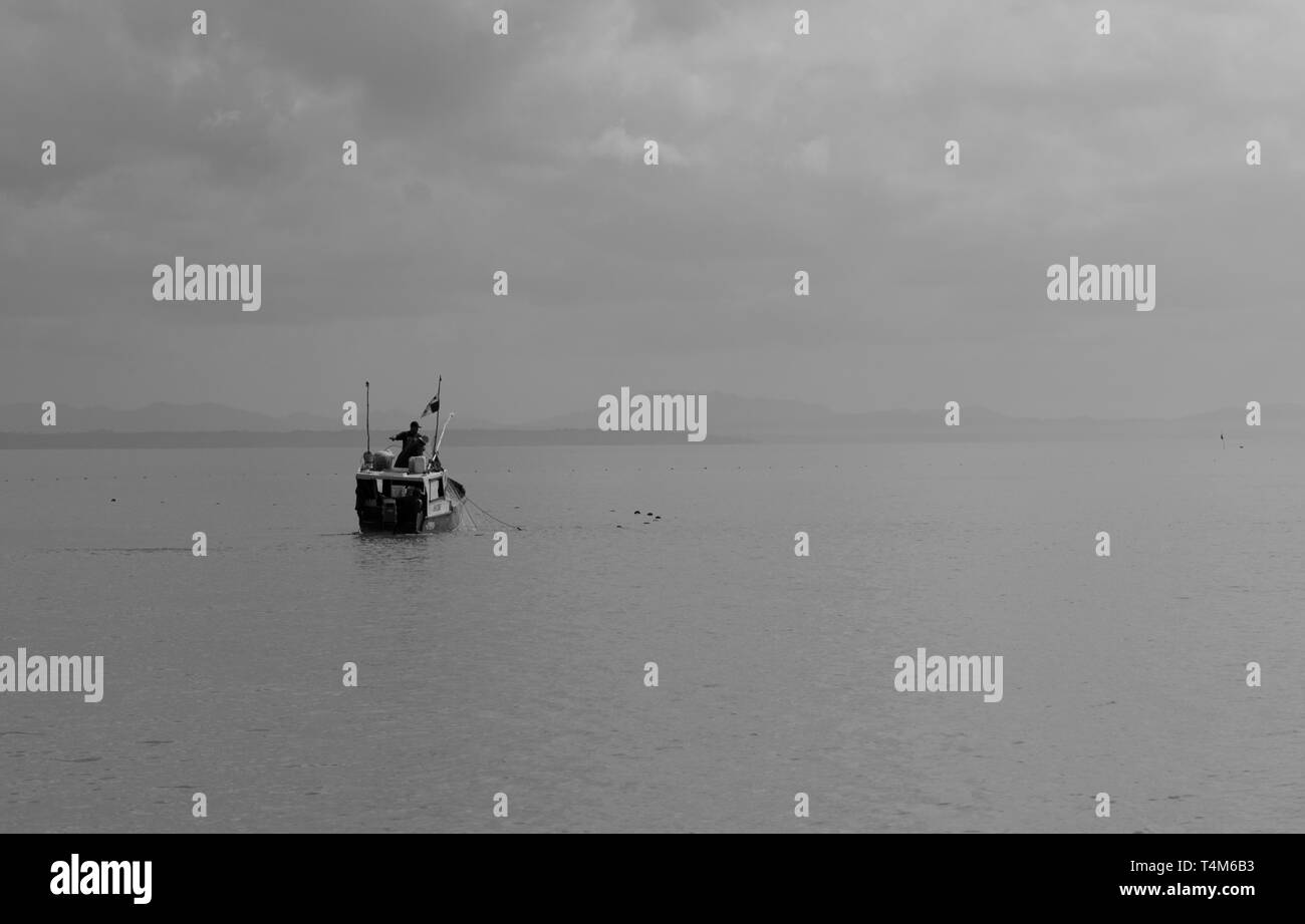 Small black fishing vessel Black and White Stock Photos & Images - Alamy