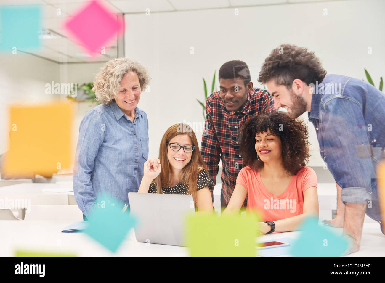 Start-Up Business Team works together on the computer in the office Stock Photo