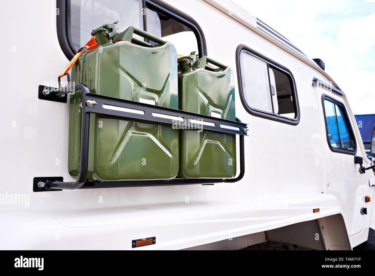 Canisters with fuel on car truck SUV Stock Photo Alamy