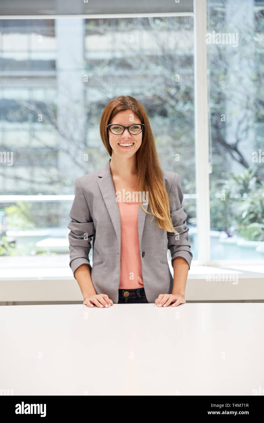 Positive business woman in hi-res stock photography and images - Alamy