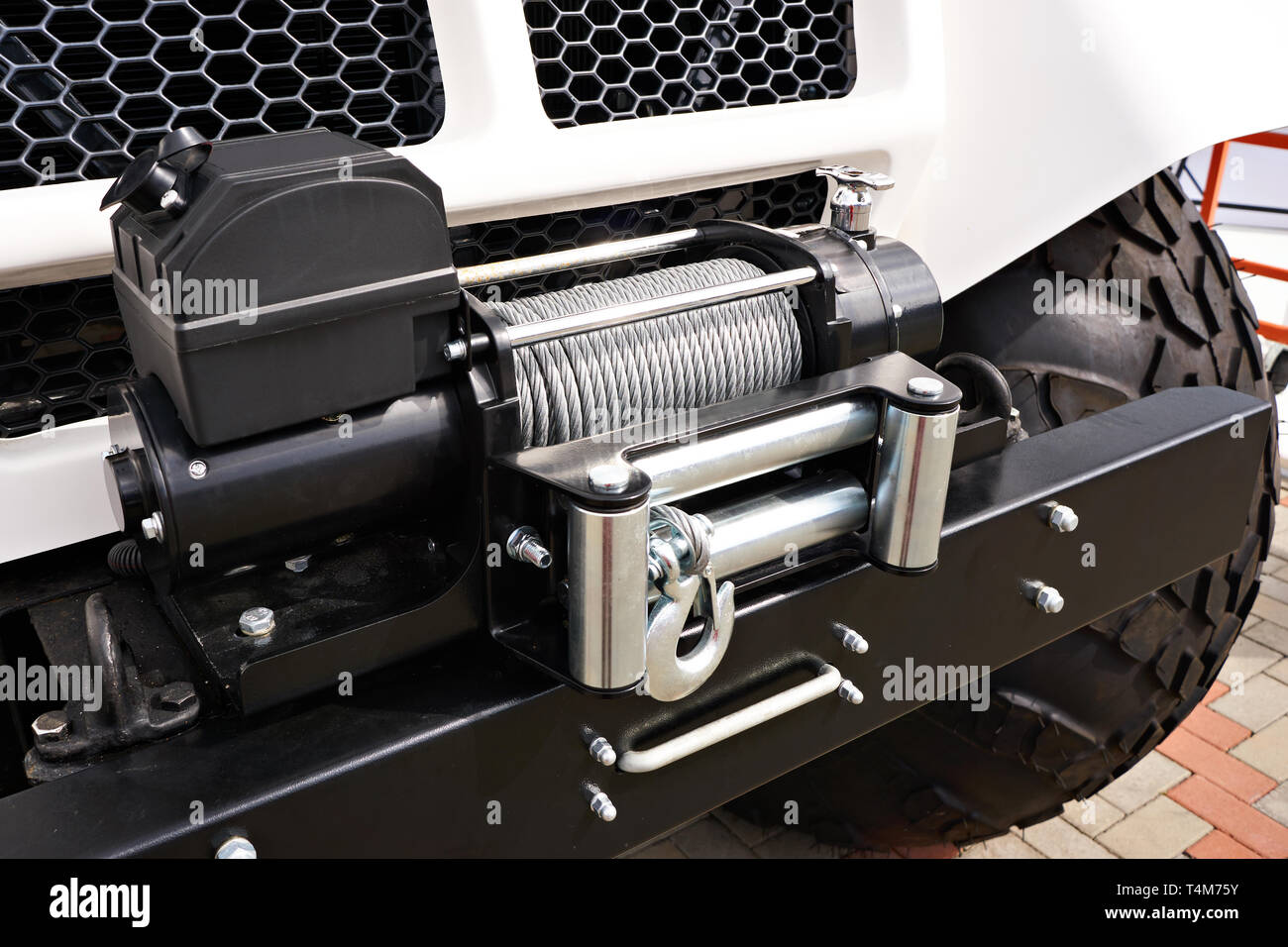 Steel wire rope winch on car Stock Photo Alamy