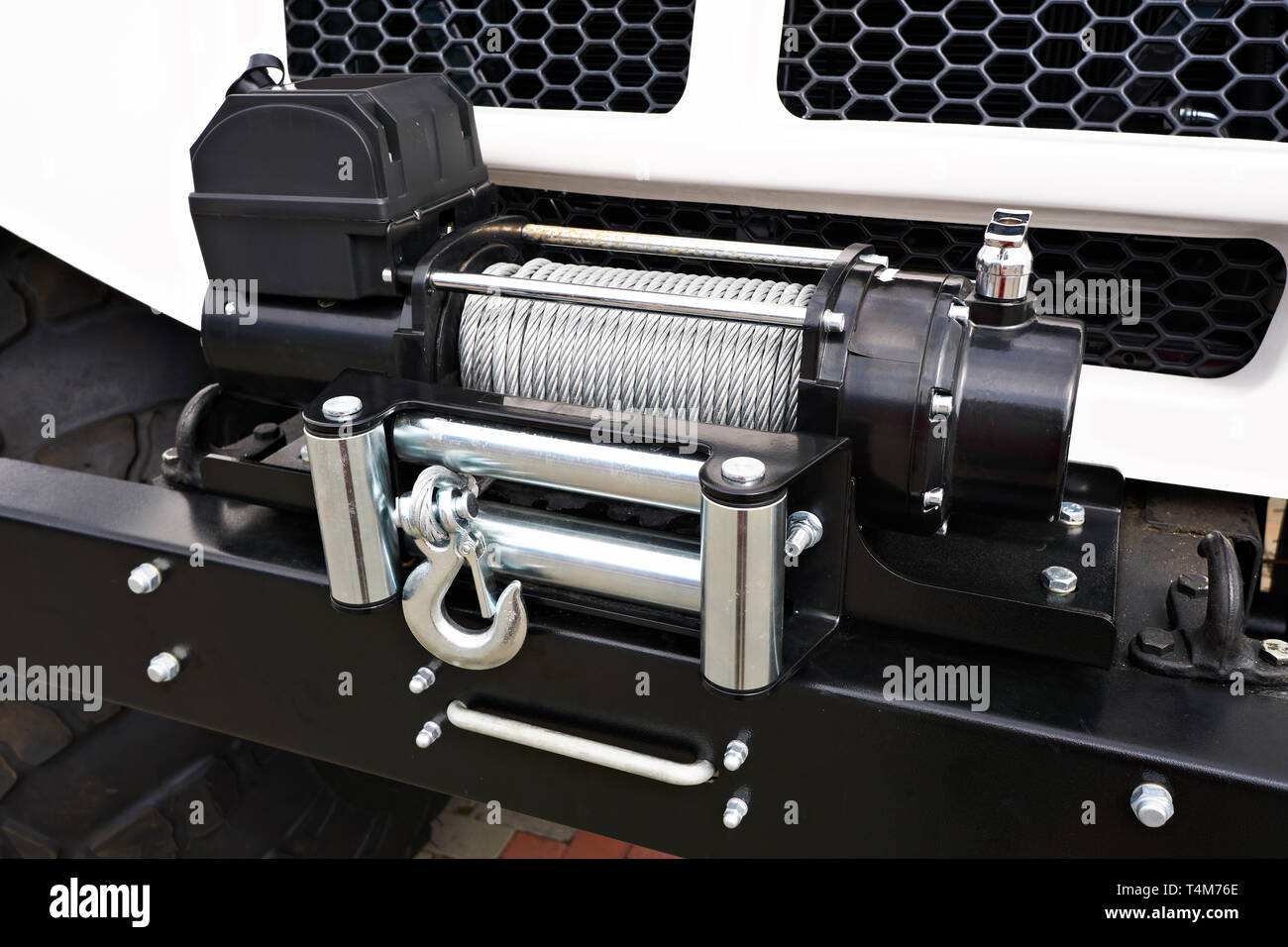 Steel wire rope winch on car Stock Photo Alamy