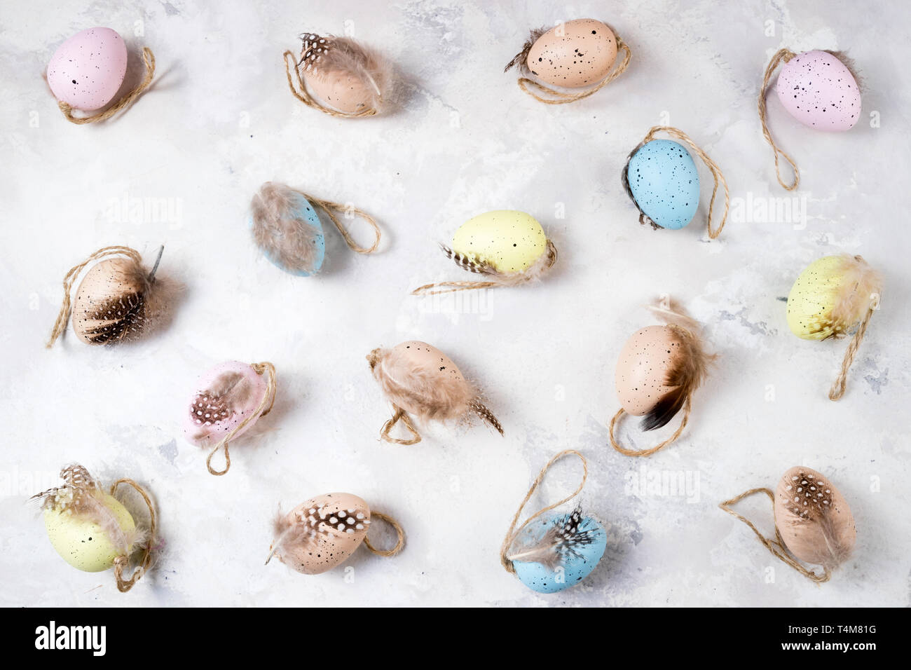 Decorative Easter eggs on stone background. Easter background. Pattern of Easter eggs top view Stock Photo