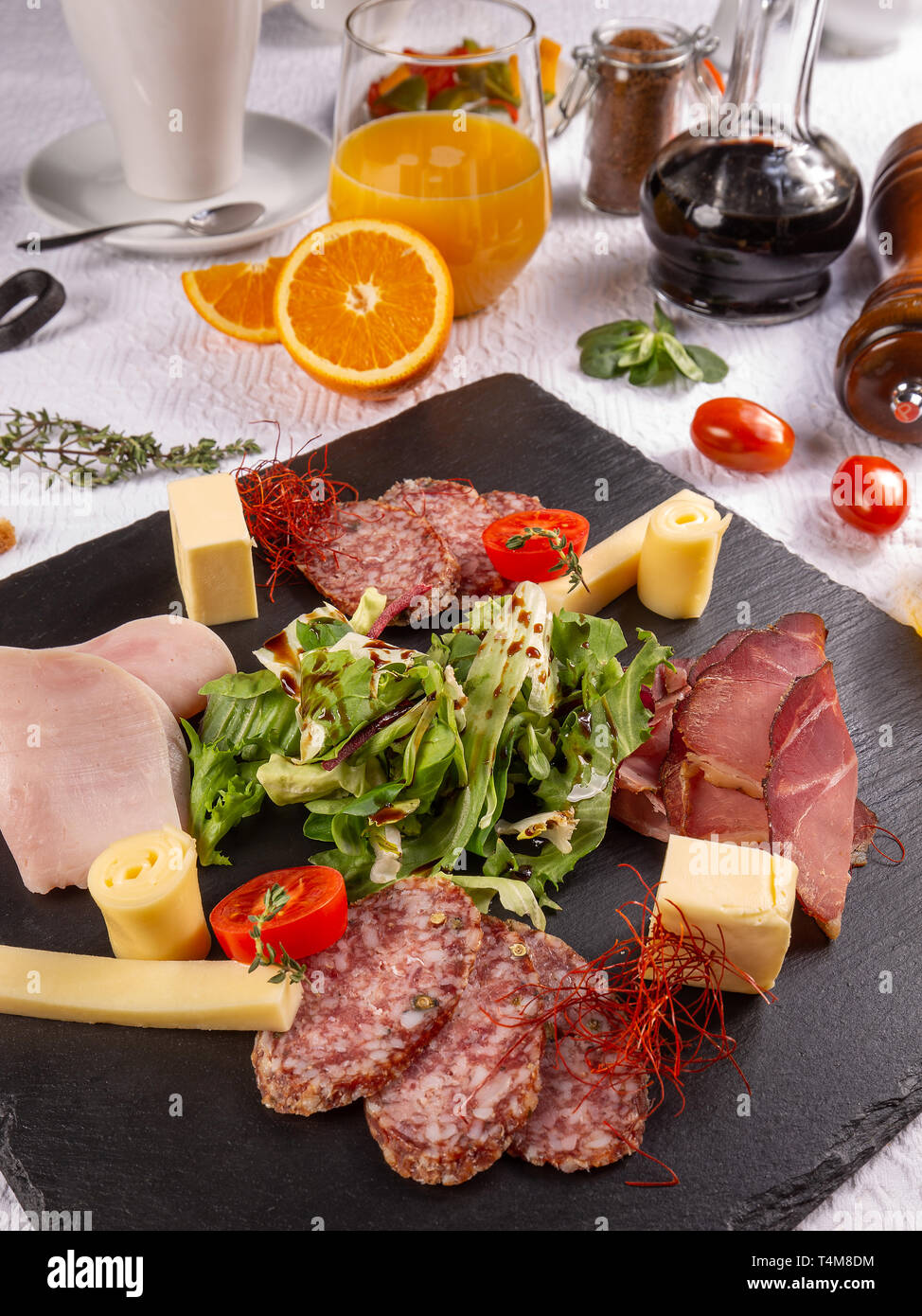 Different cold cuts for breakfast on restaurant table Stock Photo