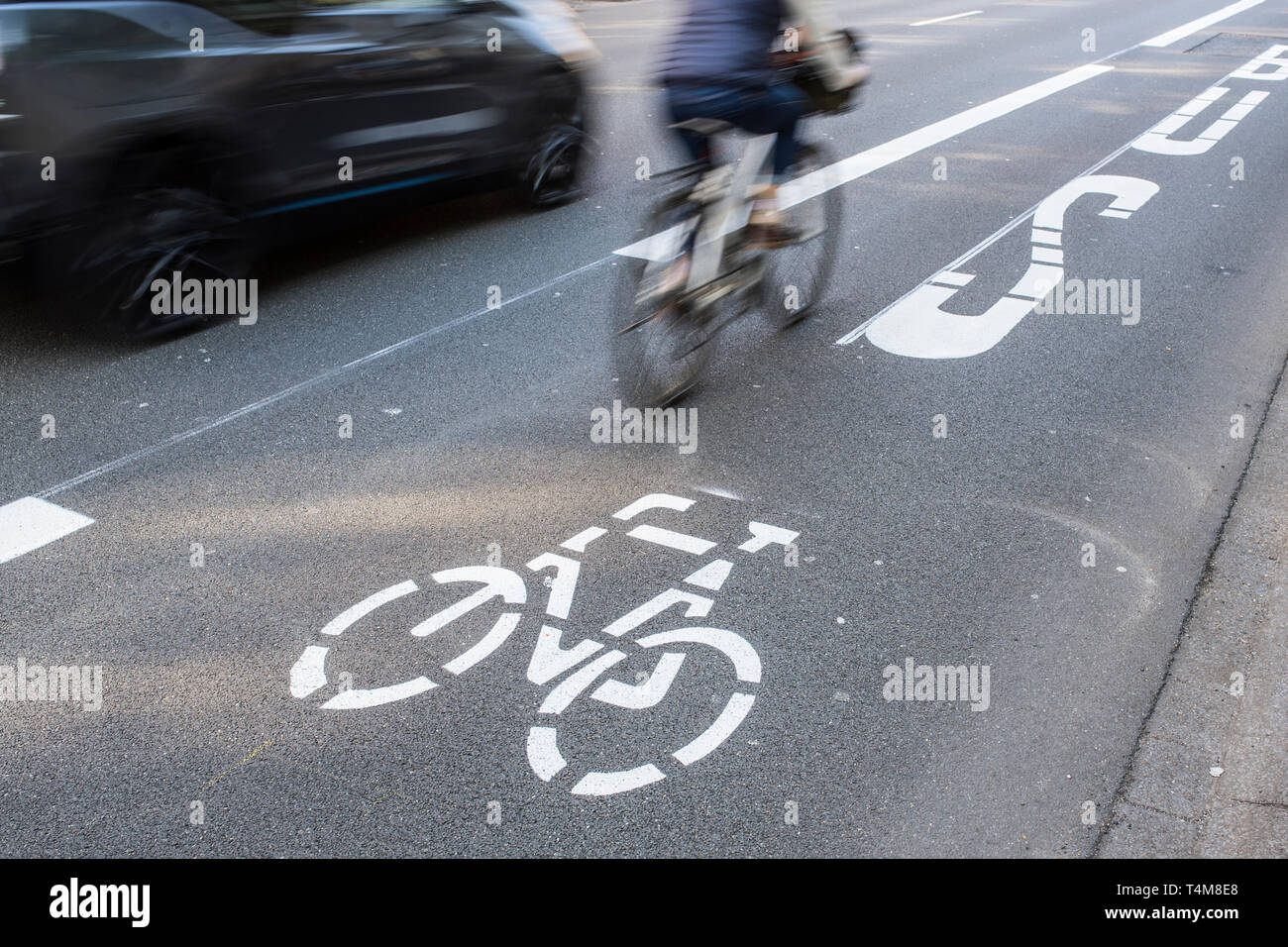 Environment lane for busses, bikes, e-cars and taxis in Düsseldorf, Germany. Stock Photo