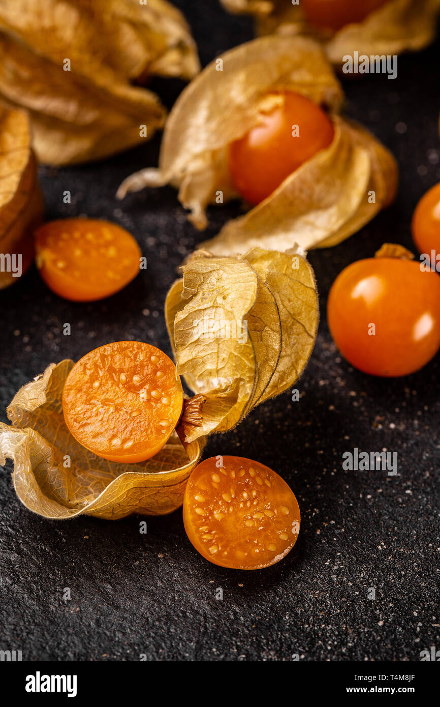 Cape Gooseberry, Physalis fruit or golden berry on black background Stock Photo