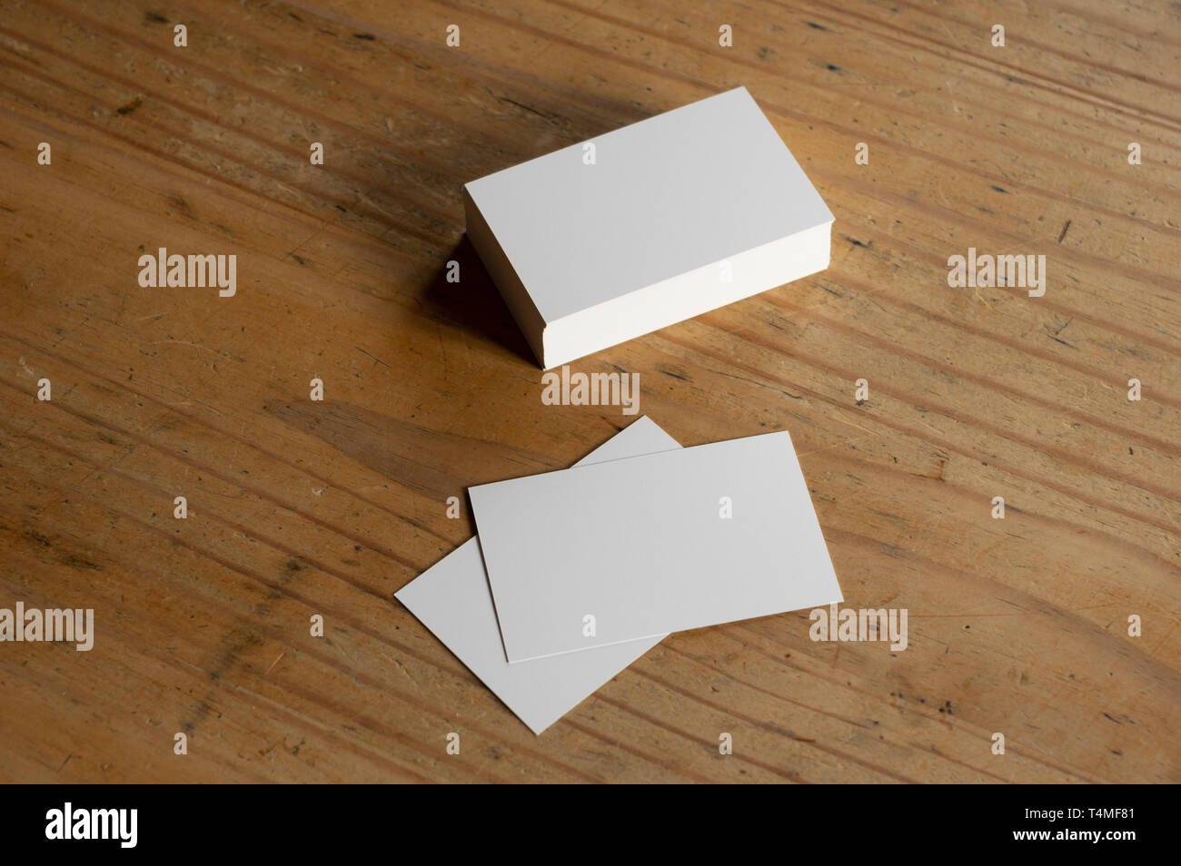 blank business card templates on wooden surface Stock Photo