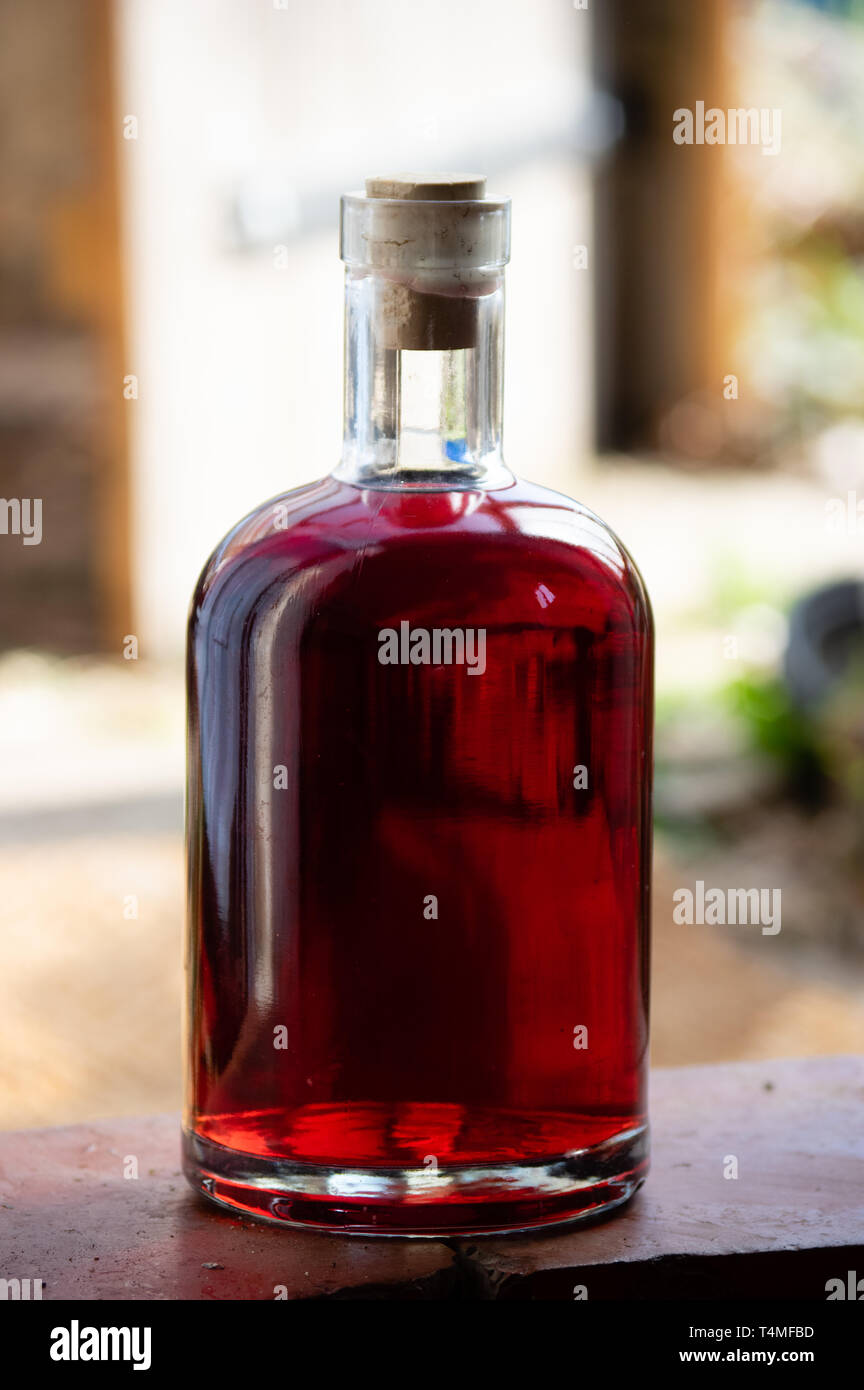homemade bottle of red wine Stock Photo - Alamy