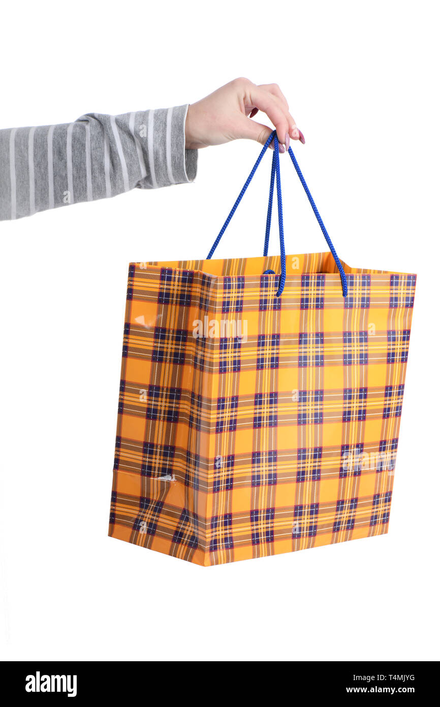 Package in female hand on white background isolation gift Stock Photo ...