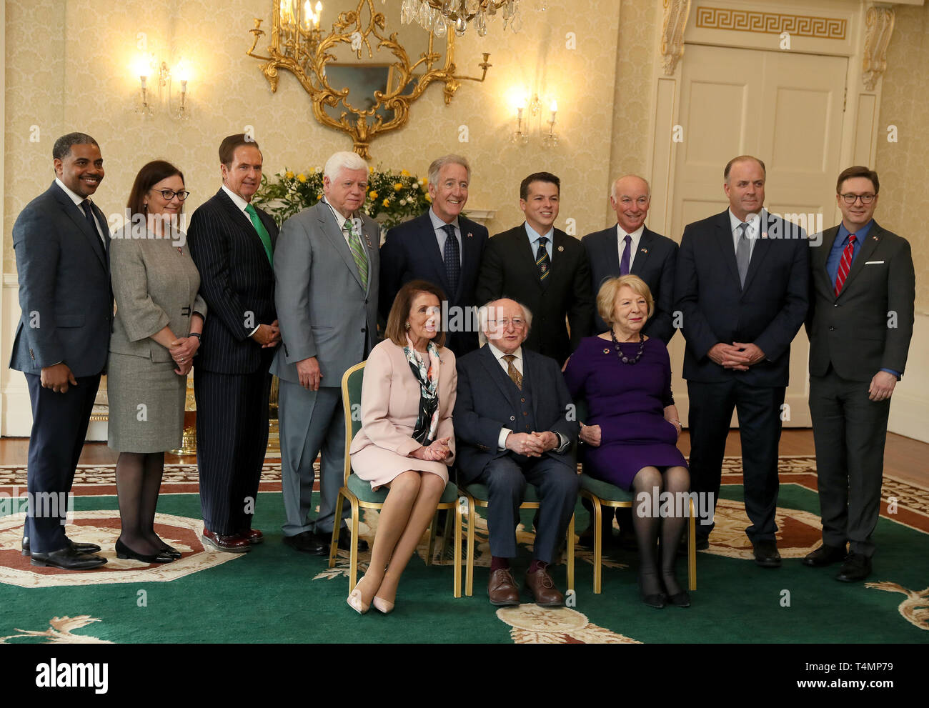 US House of Representatives speaker Nancy Pelosi (front left) is received by President Michael D Higgins (front centre) and his wife Sabina (front right) along with members of her Congressional Delegation at Aras an Uachtarain in Phoenix Park, Dublin, as part of her four-day visit to Ireland and Northern Ireland. Stock Photo