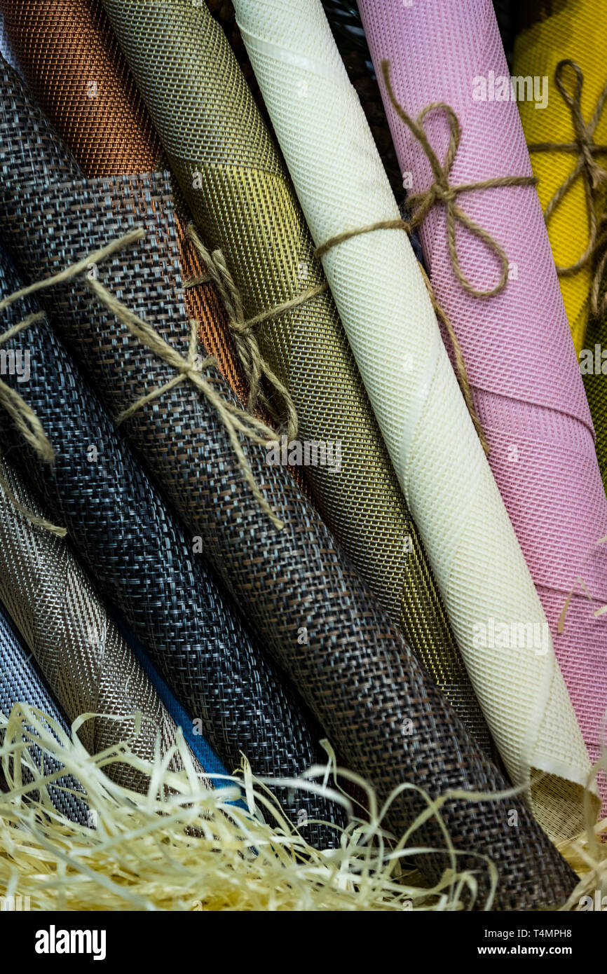 Rolls of wrapping paper binding with rope Stock Photo Alamy