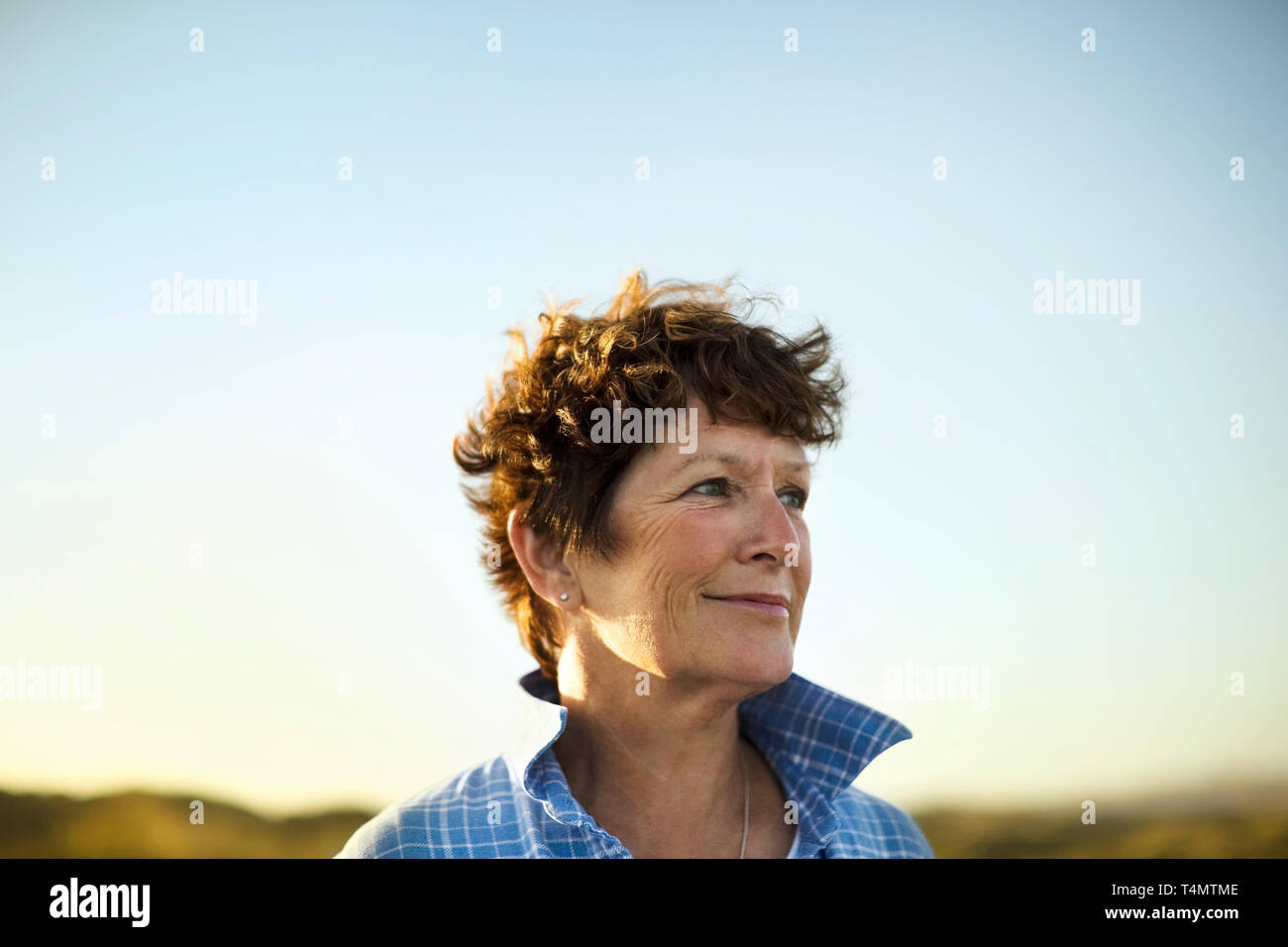 Thoughtful mature woman looking hi-res stock photography and images - Alamy