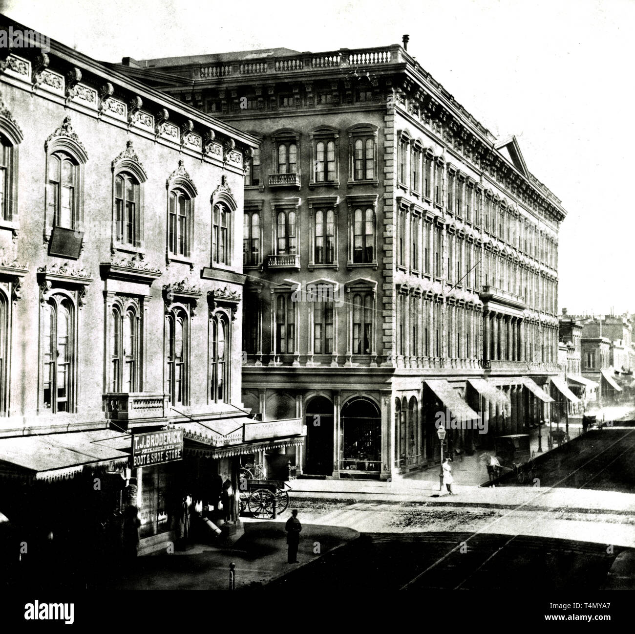 Photograph shows the corner of Montgomery and Sutter Streets in San