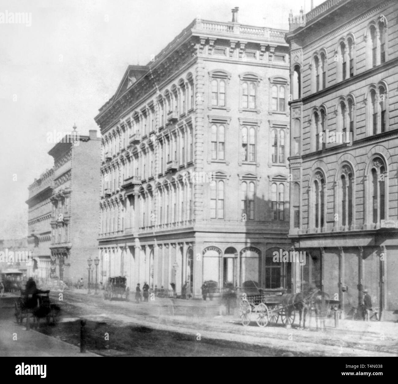 California History - Bush Street, from Montgomery to Sansome--Occidental and Cosmopolitan Hotels, San Francisco ca. 1866 Stock Photo