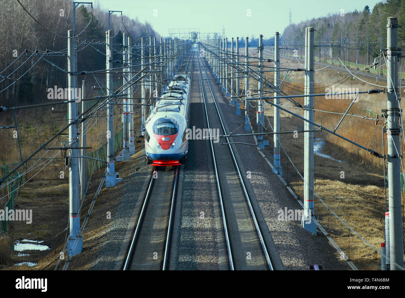 ULYANOVKA, RUSSIA - APRIL 10, 2018: Approaching modern high-speed train Sapsan EVS2-04. View from above Stock Photo