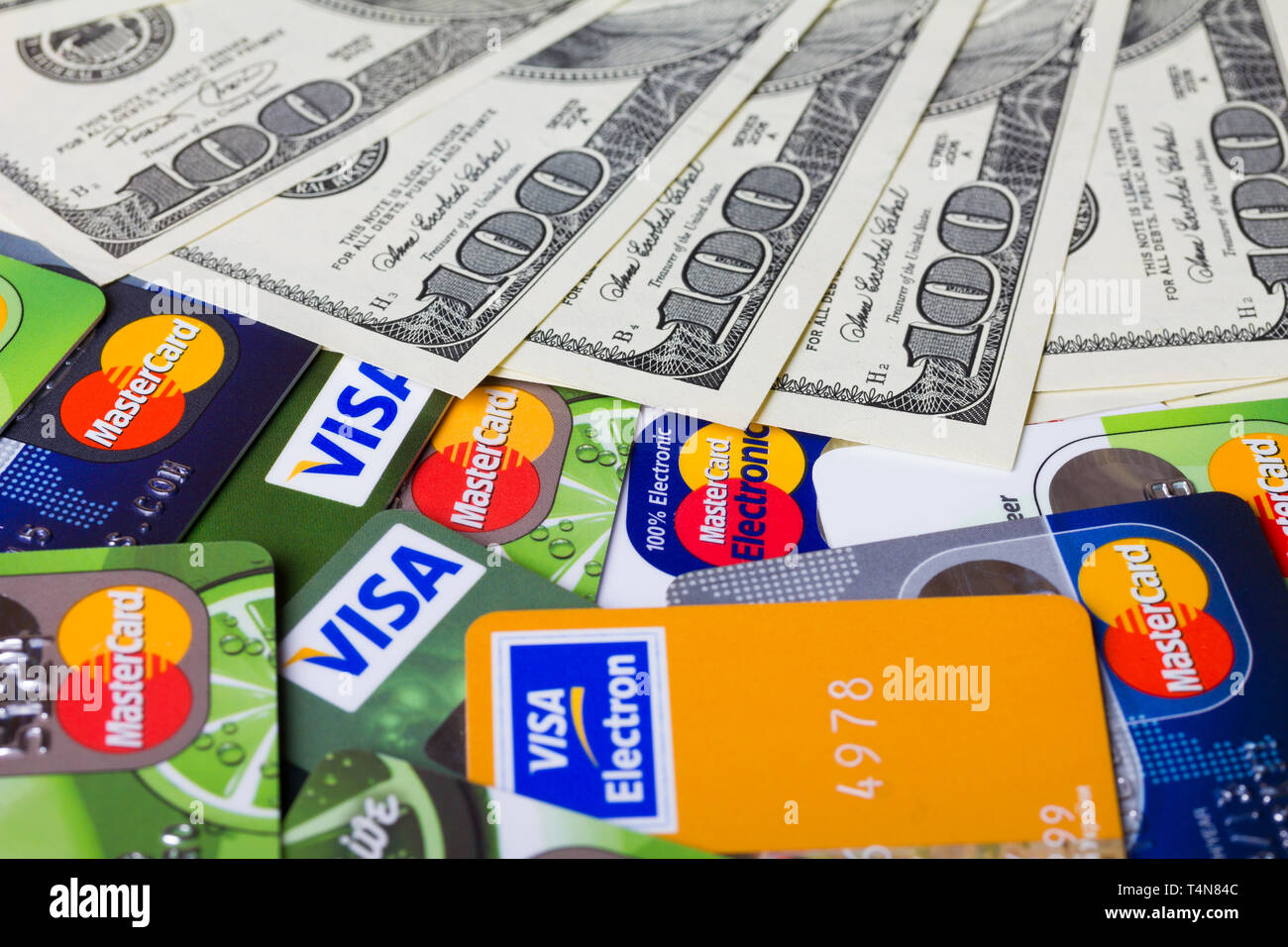 KIEV, UKRAINE - March 22: Pile of credit cards, Visa and MasterCard,  credit, debit and electronic with US dollar bills, in Kiev, Ukraine, on  March 22 Stock Photo - Alamy