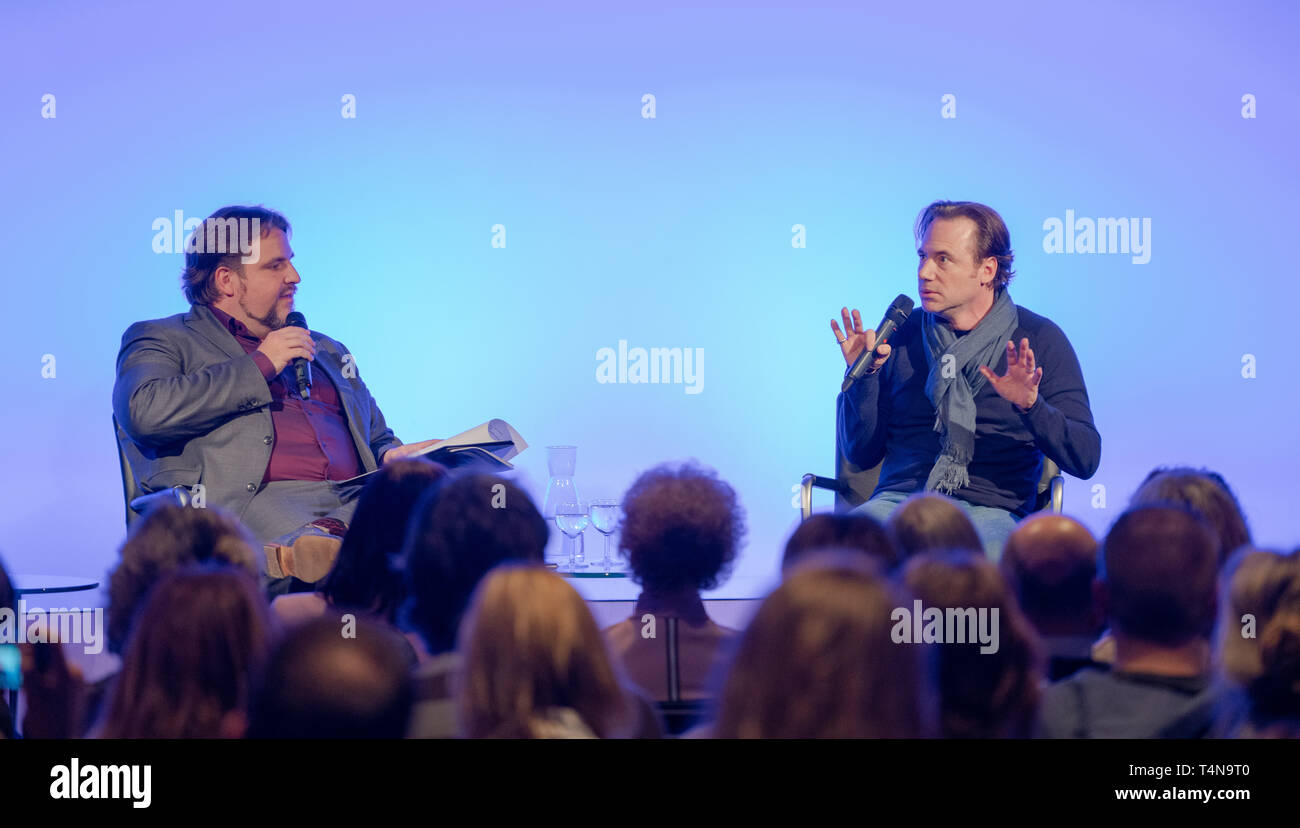 Frankfurt am Main, Germany - April 4th 2019: Michael 'Bully' Herbig and Urs Spörri talking about his experiences in the movie industry at Deutsches Filmmuseum - an evening for Michael 'Bully' Herbig Stock Photo