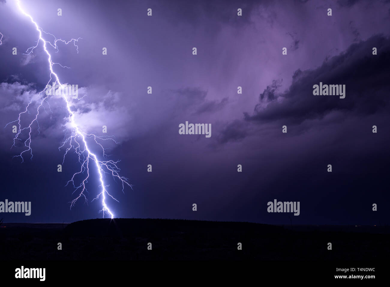 Lightning bolt strike in a thunder storm over Tucson, Arizona Stock Photo