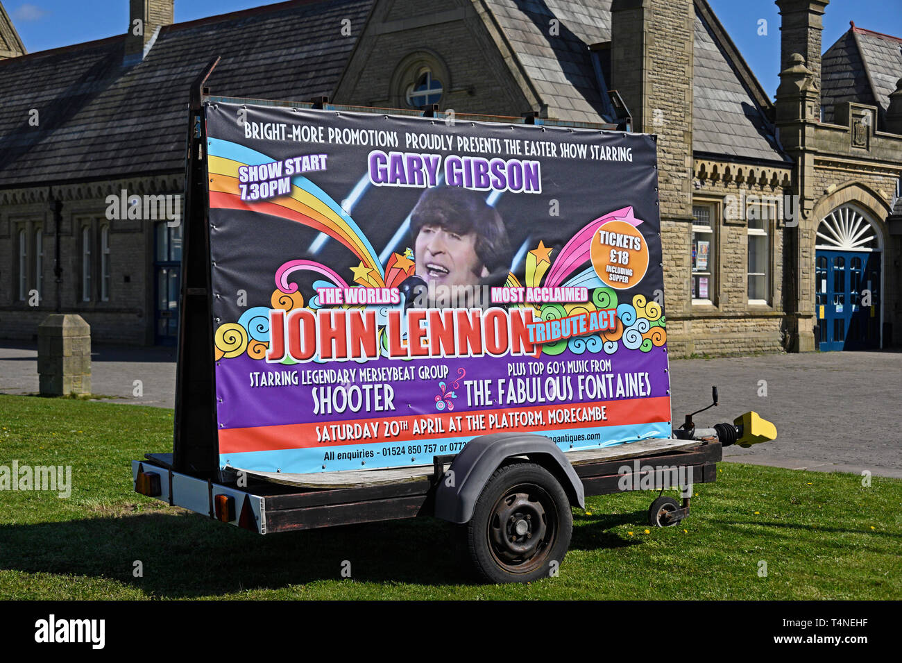 Mobile advertising hoarding. Gary Gibson the world's most acclaimed John Lennon tribute act. Marine Drive, Morecambe, Lancashire, England, U.K. Stock Photo